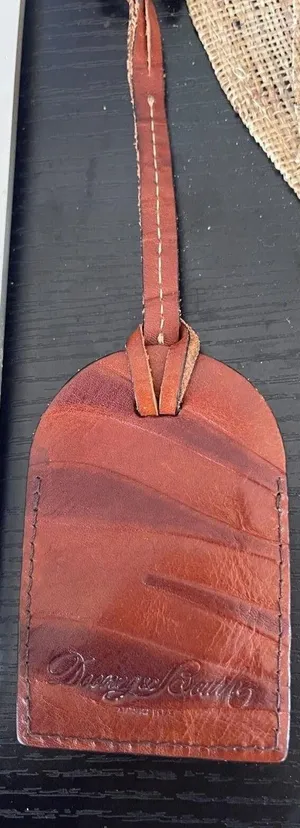 Dooney & Bourke Rare Bi-color Brown Zebra luggage Tag - euc thumbnail 1