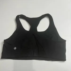 Lululemon size 8 sports bra. Hook and eye in the back up for it thumbnail 2