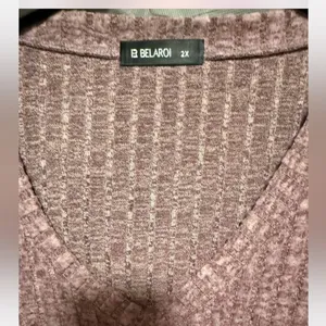 Belaroi plus size, ribbed V-neck, long-sleeve top in a mauve or purple-ish color thumbnail 7