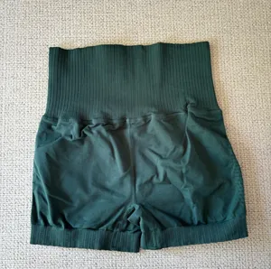 Free People NWOT Good Karma Running Shorts Radiant Blue XS/S NO exterior logo With a holds-you-in high rise and super-soft feel, these ultra-flattering running shorts transition to the track, trails and beyond. Plus, Breathable pinhole details make for a wear-every-day, no-fuss fit. Equipped with SPF 30 UV protection Ribbed, compressive waistband Super stretchy fit Ribbed hems that won’t ride up Measurements for size extra small/ small Inseam: 2.75 in Waist (Relaxed): 20 in Hips (relaxed): 24 in Rise: 9.5 in Contents 27% Spandex 73% Nylon thumbnail 6