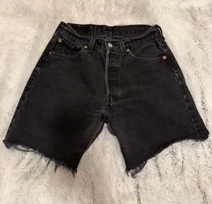 Levi's Black Raw-Hem High-Rise Denim Shorts thumbnail 1