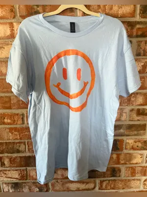 Gildan Light Blue Short-Sleeve Tee with Orange Smiley and Faith Graphic on back thumbnail 1