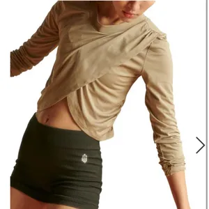 FREE PEOPLE MOVEMENT With A Twist Long Sleeve Tulip Activewear Top NWT thumbnail 1
