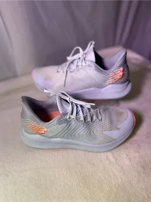 New Balance Women's Light Blue Sneakers with Coral Accents thumbnail 2