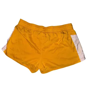 yellow Adidas athletic shorts white side panels black logo women’s medium thumbnail 3
