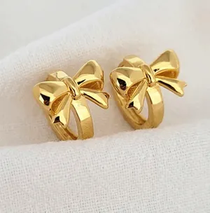 Gold Bow Hoops Earrings thumbnail 1