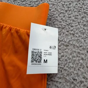 Forever 21 Womens Neon Orange Mini Skirt Size M NWT Elastic Waist Stretch Short thumbnail 3
