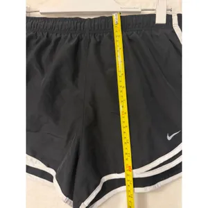 Nike Dri-FIT Tempo Running Shorts Black White Athletic Gym Training Womens Large thumbnail 2