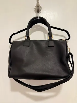 black woven duffle bag with gold hardware, some wear in the handles, no brand. thumbnail 2