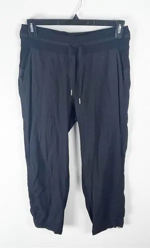 LULULEMON Black Dance Studio Secure Pockets Drawstring Waist Crop Pants Size 8 thumbnail 1