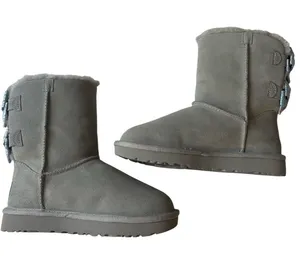 UGG Bailey Bow Abstract Splatter Boots thumbnail 1