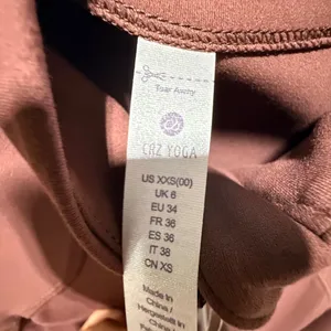 NWT CRZ Yoga brown cropped form fitting athletic jacket size 00 thumbnail 2