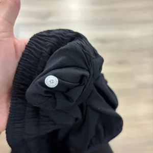Lululemon Hotty Hot Short High-Rise Long 4" Women Size 12 Black thumbnail 2