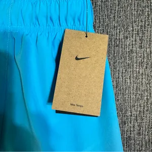 Nike Women’s Tempo Dri-Fit Mid-Rise 3-Inch Running Shorts thumbnail 12