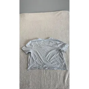 Lululemon Womens Light Blue V-Neck Short Sleeve Cropped flaw cut Tee Shirt thumbnail 6