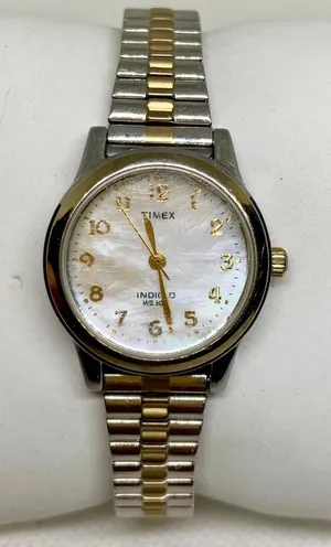 Timex indiglo women’s watch silver gold tone mother of pearl dial 25mm running thumbnail 1
