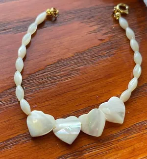 Vintage Midcentury mother of pearl beaded with carved hearts bracelet thumbnail 1
