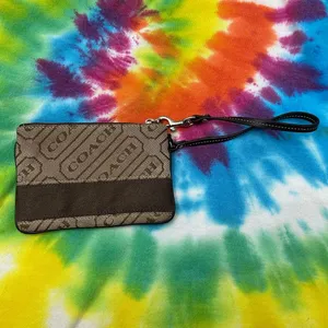 💜COACH Signature Stripe Lozenge Wristlet in Brown and Tan Fabric thumbnail 4