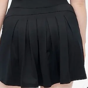 J crew athletic skirt with shorts underneath back pleats smooth front sz small thumbnail 1