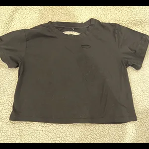 Womens cropped ripped distressed T-Shirt Size Medium. Rips on front and back thumbnail 7