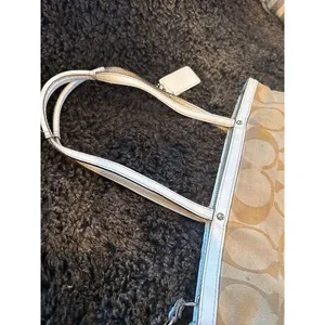 Signature coach bag with accent thumbnail 7