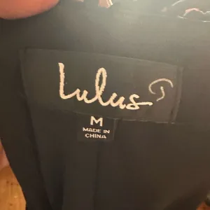 Lulu’s Tell Me chic minimalist sleeveless little black dress thumbnail 4