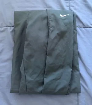 Nike Dri Fit Women's Dark Green Ultra High Waisted Pants thumbnail 1