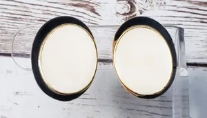 Vintage Clip On Earrings Cream & Black Oval 1 & 1/8" Statement thumbnail 1