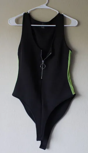 Forever 21 Black zip-up bodysuit with mesh neon green on the sides. thumbnail 1