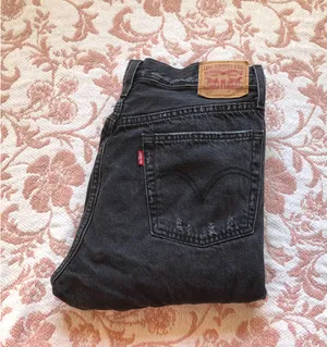 Levi's 501 black jeans with ripped knees #denim thumbnail 2