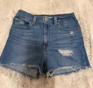 Levi's Medium Blue Distressed Denim Shorts thumbnail 1