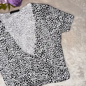 Brandy Melville Black and White Dotted Wrap Top thumbnail 4