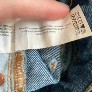 Primark high rise blue distressed jean shorts in size 0 thumbnail 4
