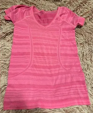 Pink lululemon shirt thumbnail 1