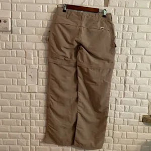 The North Face women's. Convertible Pants Beige Cargo Shorts Hiking Outdoor thumbnail 2