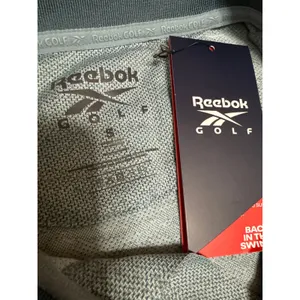 NEW Reebok Golf Blue Sleeveless Tonal Vector Jacquard Polo Shirt Top Size S thumbnail 4