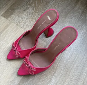 Amina Muaddi pink satin heels with rhinestone bow detail thumbnail 1
