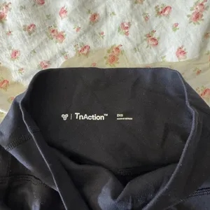 aritzia tna tn action straight leg flare black leggings thumbnail 3