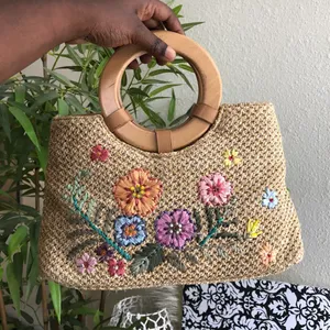 Tan beige cream woven straw hand tote bag with embroidered flowers and wooden handles thumbnail 1