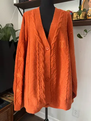 Official Taylor Swift The Life of a Showgirl Burnt Orange Cable Knit Cardigan thumbnail 1