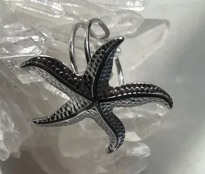 Silver stainless steel starfish ring with textured surface adjustable thumbnail 1