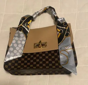 brown tan purse thumbnail 1