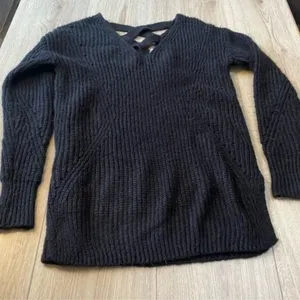 It's Our Time Black Crisscross V-Neck Ribbed Sweater sweatshirt thumbnail 1