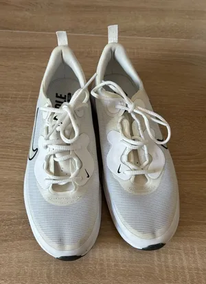 Nike Women's White Mesh Sneakers with Black Swoosh thumbnail 1