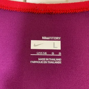 Nike Fit Dry Womens Large Purple Red Mesh Trim Athletic Training T-Shirt Gym Run thumbnail 2