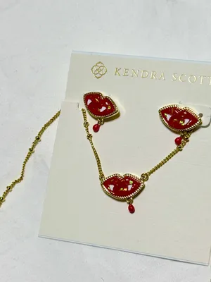 Kendra Scott red lip earrings featuring a playful vampire fang and blood drop de thumbnail 2