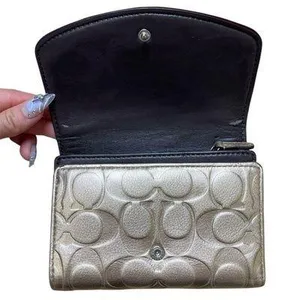 Shiny Metallic Gold Coach Signature Trifold Wallet thumbnail 3