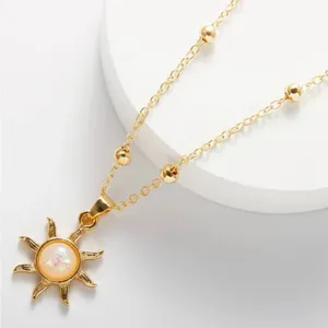 Gold Opal Stone Sun Charm Necklace thumbnail 1