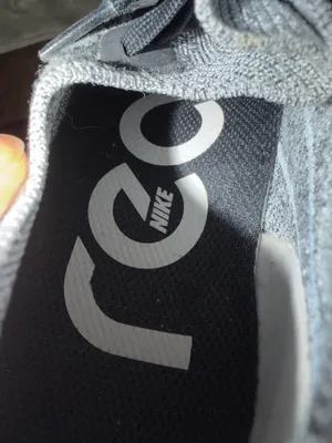 Black, white, grey epic react Nike shoes thumbnail 5