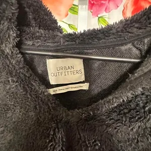 B84. Urban Outfitters black faux fur hoodie thumbnail 2